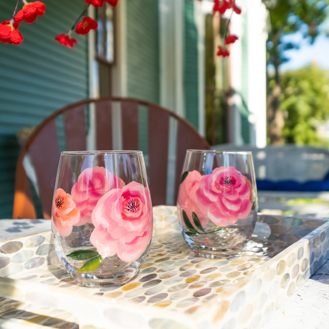 Image of floral decal wine glases on porch at Jade Estate Inn